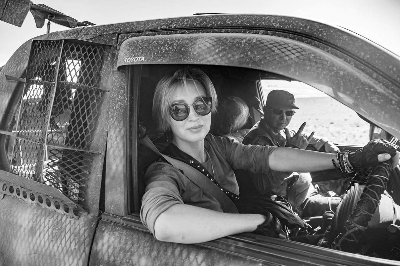 Anna Gubareva and Alexey Gubarev in the cab of a MadWay Rally truck