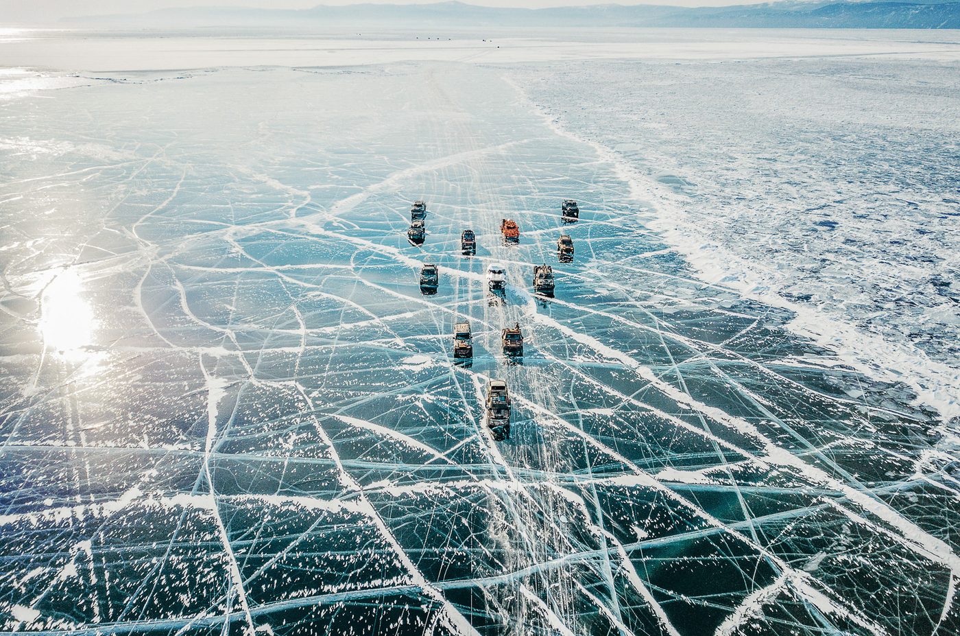 Motorcycles on the transparent ice of Lake Baikal — where MadWay Rally began