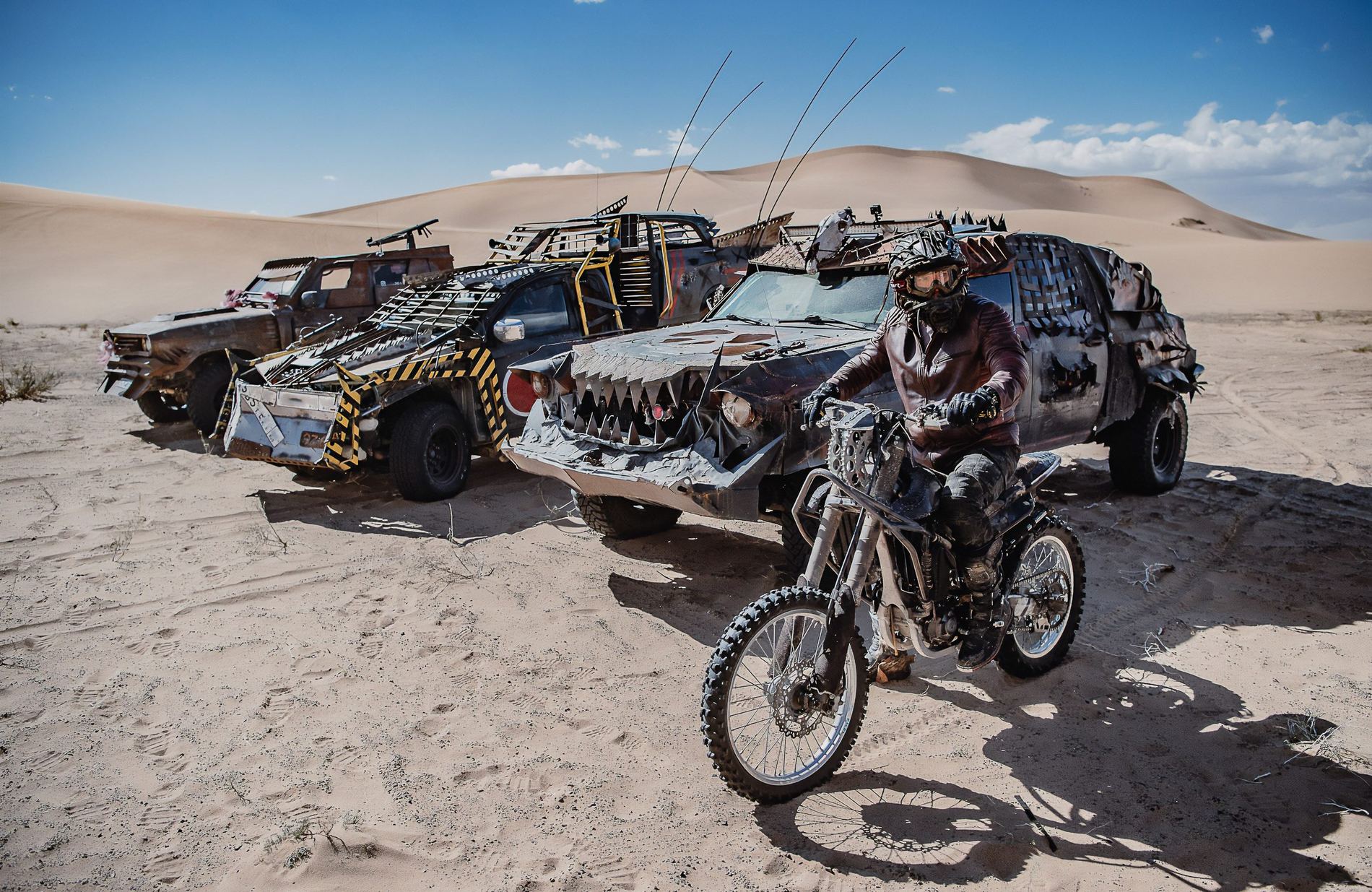 MadWay Rally Mad Max style cars and motorcycle in the dunes of the Gobi Desert, Mongolia