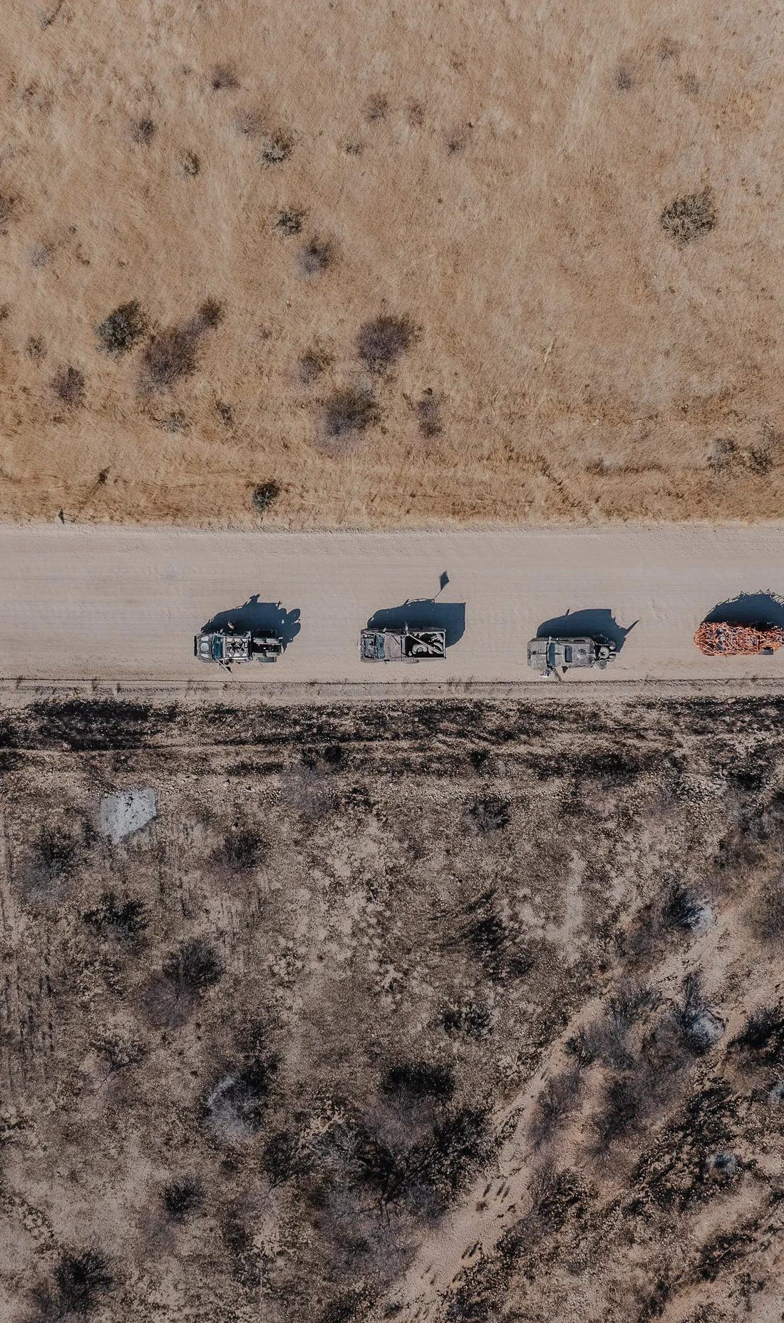 Aerial view of the MadWay Rally convoy crossing the Mongolian steppe