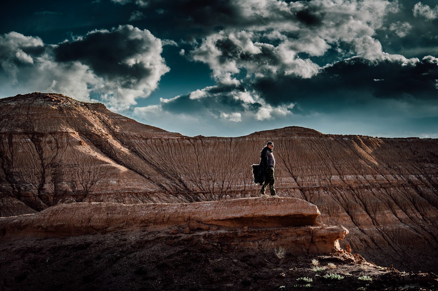MadWay Rally participant standing on a dune ridge in Mongolia