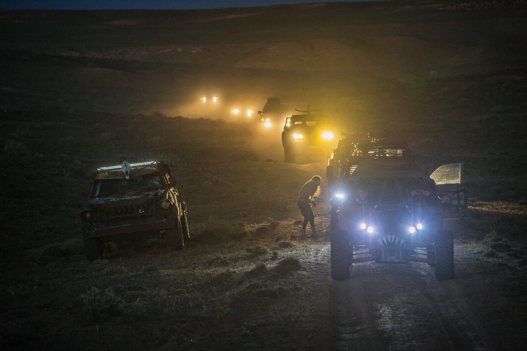 Alexey Gubarev's MadWay Rally convoy driving through the night with headlights on