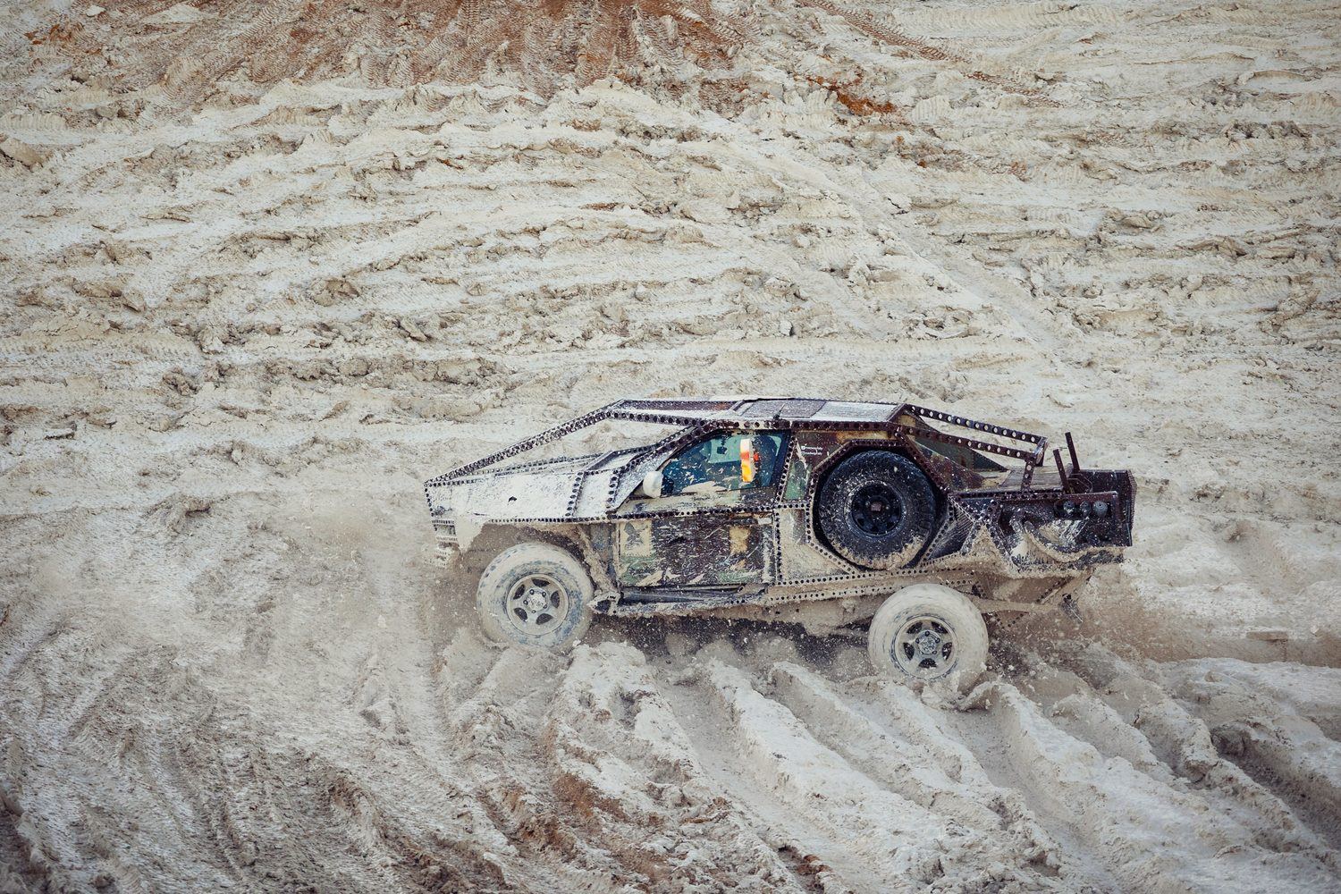 MadWay Rally car racing through a sand quarry in South Africa